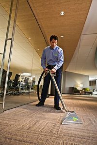 technician cleaning carpet