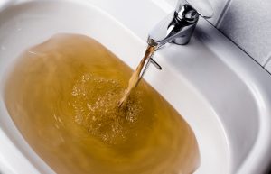 dirty water in sink. sewage backup cleanup services